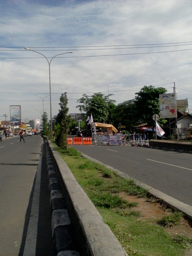 Portal jalan Tanjung Pura menuju Pangkal Perjuangan, diarahkan ke Lingkar Tanjung Pura